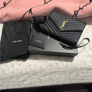 Brand New Ysl wristlet/clutch 100% Authentic